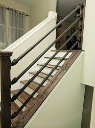 Electrical Conduit And Cedar Post Diy Handrail Rustic Stairs Stair Remodel Stair Railing Makeover
