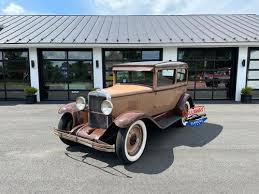 Image result for Crockett Brown 1929 Oldsmobile