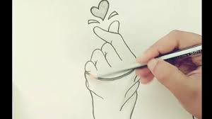Learn how to draw holding hands with the following simple step by step instructions. How To Draw A Heart With Hand With Thumb And Finger Youtube