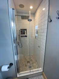 I like the glass enclosed tub or shower to open up the space. Small Bathroom Ideas To Make Your Bathroom Efficient