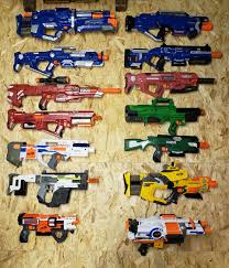 Storage of our nerf guns. So Here Are Most Of My Integration Cosmetic Builds I Am Making A Wall Rack For Them As I Laid Them Out On The Floor To Figure Out How Much Space I Need