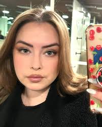 Meet EZ(ee-zee)! He was born August 4, 2020, a blue and brown dapple, one  blue eye one green. He is the happiest most energetic puppy, who still  fully enjoys his naps. His