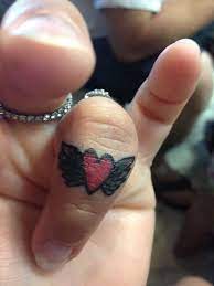 Wedding Ring Finger Tattoo Heart With Wings Heart With Wings Tattoo Tattoo Wedding Rings Wedding Ring Finger