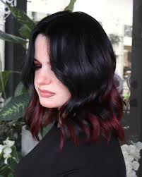 when you do a color that just matches your clients vibe SO WELL 🤌🏻 it's  my favorite thing 🖤❤️🧡 • • black hair, red vivid haircolor, fall inspo,  halloween, peekaboo, color melt,