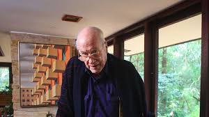 Hill with steeply sloping sides and flat top — town in montana. At Home With Clive Evatt
