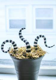 Check out how i made this huge sandworm sign from the beetlejuice movie for my outdoor halloween yard display. Diy Beetlejuice Potted Sand Worm Vintage Halloween Decorations Beetlejuice Halloween Diy Halloween Decorations