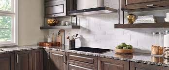 Compact dark brown and cream colors dominated the kitchen with light color granite countertops. 5 Perfect Kitchen Countertop And Flooring Matches For Dark Cabinets