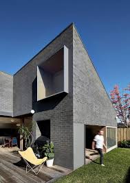 Norwich airport provides access to many holiday locations in and out of the country. This Black Brick House Features Generous Spaces With A High Degree Of Flexibility