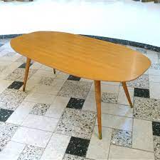 Saw something that caught your attention? German Birch Wood Coffee Table With Brass Feet 1950s 65171