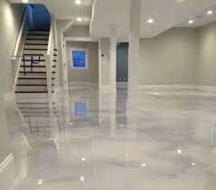 Homeowners pay an average of $2,218 to coat an existing concrete floor. What Is Metallic Epoxy Flooring Basement Remodeling Basement Decor Basement Renovations