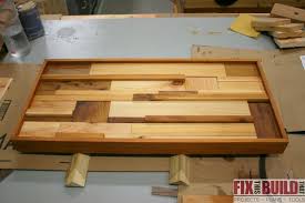 You can make it out of scrap wood from previous projects. Scrap Wood Wall Art Fixthisbuildthat
