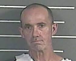 Thomas Slone** from Pikeville, KY, age 53, was booked in