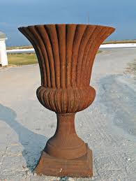 Best porch pot ideas with how to choose pots and urns, use a variety of evergreen plants and branches, colorful berries. Cast Iron Garden Urn Planters