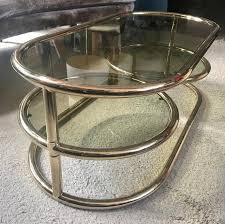 Rated 5 out of 5 stars. Swiveling Coffee Table Smoked Glass Plates By Morex 1970 For Sale At 1stdibs