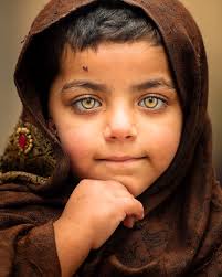 Afghan Refugee Girl in Peshawar Pakistan She does not know what her future  holds. Her bright eyes are like a ray of hope......