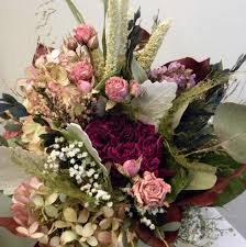 Perfect wedding bouquet for any venue in pale peach/pink, lavender, blue/gray, and creamy white. Dried Flower Bouquet Pink Good Old Days Florist