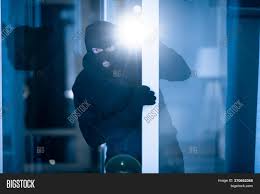 The black paint(?) is wearing off. Burglary Concept Evil Image Photo Free Trial Bigstock