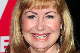 Weather forecaster Sian Lloyd breaks wrist after racing colleague in  wellies