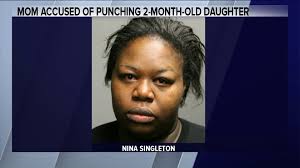 Woman accused of punching 2-month-old baby, slamming her to the ground