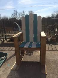 Reclaimed pallets make a good timber alternative. Painted Pallet Adirondack Chair Easy Pallet Ideas