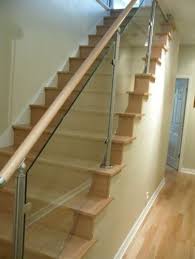 Forged steel handrails are available in a variety of sizes to meet your project needs. Contemporary Staircase Wood Stairs And Stainless Steel Glass Railings Glass Staircase Wood Stairs Staircase Metal