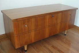 It has decorative pulls, a valet tray, and splayed leg design. Lane Mid Century 1964 Cedar Chest Antique Appraisal Instappraisal