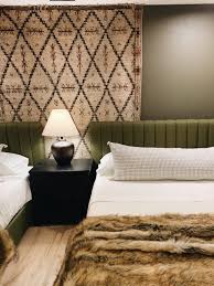 There are no shortage of options when it comes time to select the perfect area rug for your bedroom or home. The Easiest Way To Hang A Rug On A Wall Chris Loves Julia