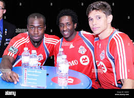 Nana Attakora, Fuad Ibrahim, Adrian Cann MLS Toronto FC season launch at  the BMO Main Branch. Toronto, Canada