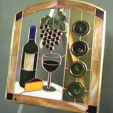Authentic stained glass panels require lots of specialized tools, a fairly large workspace, and working with exposed glass edges. How To Make A Wine Bottle Stained Glass Panel Hgtv