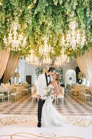 Most wedding coordinators and bridal planning guides suggest that couples set aside between eight and ten percent flower color: Remarkable Ceiling Installations Over The Dance Floor