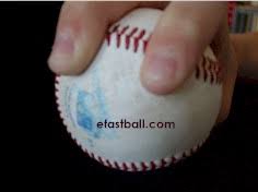 This is achieved by taking your middle and index fingers of your throwing hand, and placing it perpendicular to the horseshoe of the seams on the baseball. Four Seam Fastball Grip