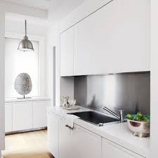 Custom stainless steel metal backsplashes and wall the silver metal and glass tile is perfect as kitchen backsplash and bathroom wall for your home. 25 Trendy Metal Kitchen Backsplashes To Try Digsdigs