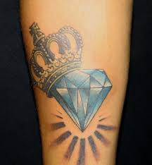 Rose tattoos on various body parts. View 42 Money Rose And Diamond Tattoo Designs