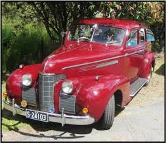 Image result for Trojan Maroon 1939 Oldsmobile