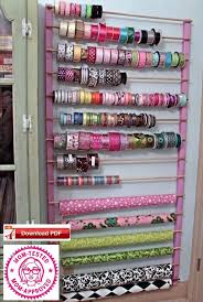 Get a few baskets and hooks to increase the storage space and get everything organized. Craft Room Organizer Plan Ribbon Holder Plan Wrapping Paper Etsy