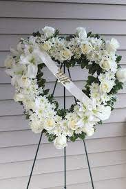 Check spelling or type a new query. All White Sympathy Open Heart Arrangement Funeral Flower Arrangements Funeral Floral Arrangements Funeral Flowers