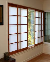Panels fashioned from white rice paper with a red and black plum branch print. 4 Panel Cherry Shoji Screens Synskin Ebony Finger Pulls Shoji Screen Room Divider Japanese Sliding Doors Shoji Screen