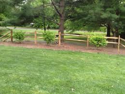 Like all fences, they need gates for access and enclosure. Split Rail Fence And New Bushes Gorgeous Split Rail Fence Fence Landscaping Rail Fence