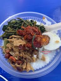 Tumis bawang putih dan masukkan potongan hati ayam hingga matang. Bubur Berlauk Pontian Makan Sedap Johor Facebook