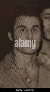 In this photo taken Thursday, Jan. 8, 2015, Steve Clark talks about his  friend and neighbor Karen Hellmuth