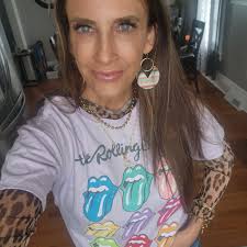 Which earrings should I wear with a statement shirt, colorful or gold hoops?