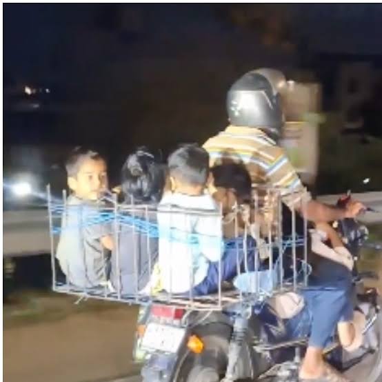 Karnataka man rides with 5 children packed into metal basket one seated in front - India Today