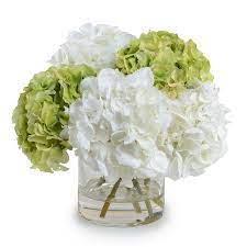 Whether you're looking for office decor or a quick home makeover, refresh any space with faux greenery in cute pots that complement it. Green And White Hydrangea Faux Arrangement Hydrangea Arrangements Hydrangea Flower Arrangements Green Hydrangea