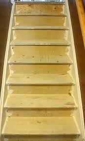 Here, the carpet rolls over the flight of stairs without the need for a firm placement. Stairway Remodel Part 1 Ripping Out Old Carpet And Finding Pressboard Plywood The Cookie Writer Diy Stairs Staircase Remodel Diy Diy Staircase