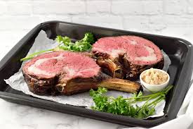 After the meat is browned, transfer it to a roasting pan with the fat side up. Best Slow Roasted Prime Rib Roast And Au Jus For Two Zona Cooks