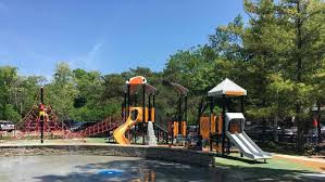 A backyard splash park that can be setup or stored in minutes and customized | check out 'splash2o: Hubbard Woods Splash Playground Open