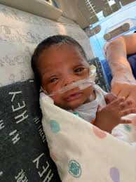 Getting to hold my son for the first time. He was born at 25 weeks, 2  pounds and 2 ounces. I was told by doctors that my son and I would not