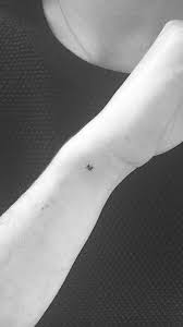 46 Tiny Tattoo Ideas Even The Most Needle Shy Can T Resist Tiny Wrist Tattoos Celebrity Tattoos Resist Tattoo