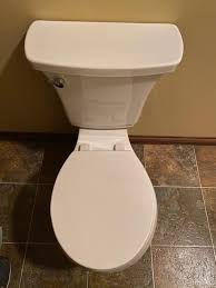 A brilliant blend of style and water efficiency, this highline arc toilet is distinguished by an elegant flared K 30369 Highline Curve Complete Solution Toilet Kohler