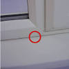 It will help if you can get the fingers of one hand over the top of the frame to support the edge of the glass while you press the duct tape more firmly in place. 1